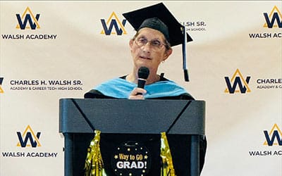 Dr. Ann Craig, Ed.D., addresses Walsh Academy's first graduates