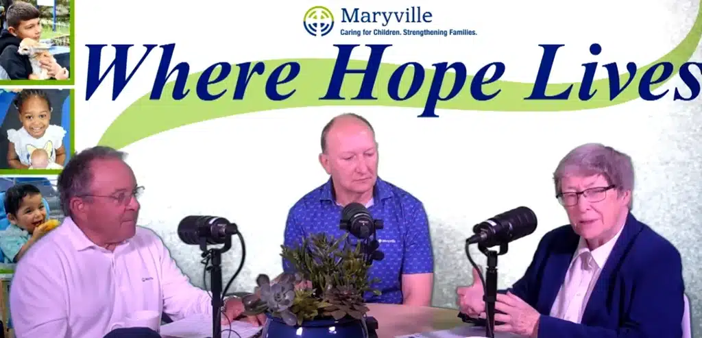 Sr Catherine M Ryan,Sr , Juan Espejo, and Nikola Prvulov discuss Maryville Golf Academy